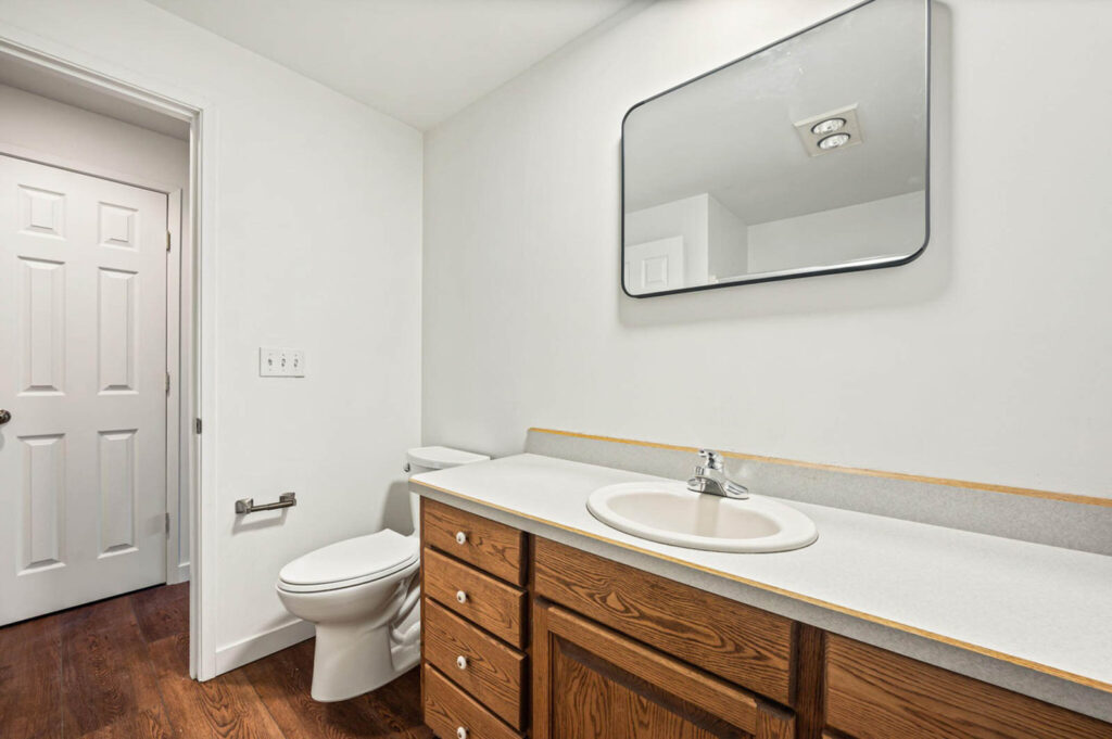 Bathroom before remodel on Brokie Way estate project by Upright Build Co.